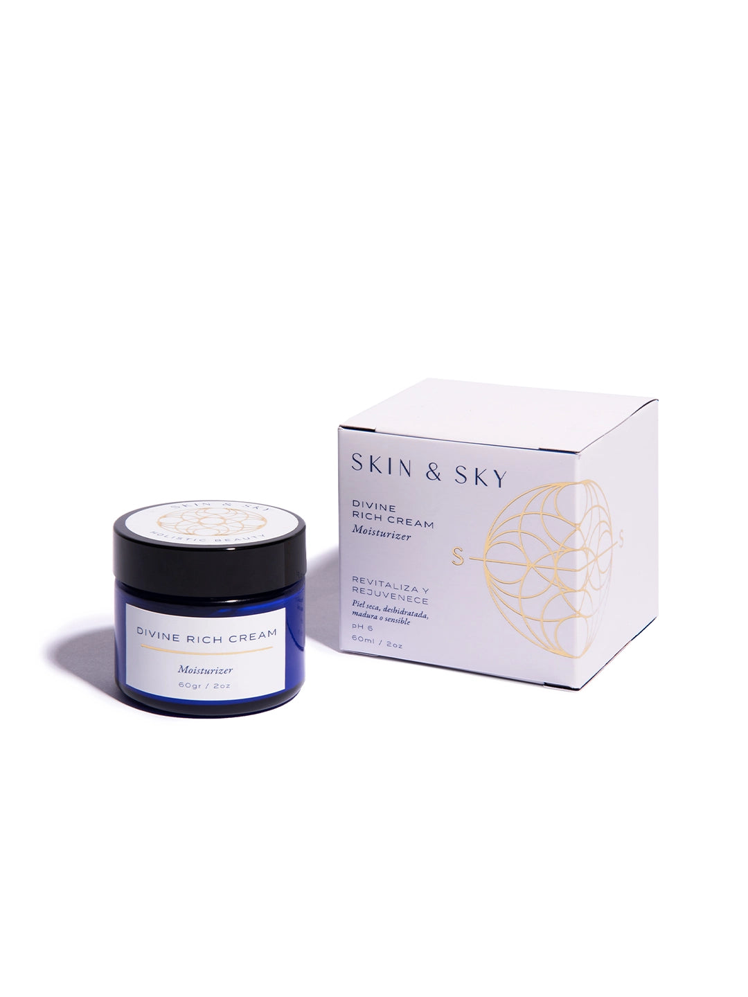 Tarro de vidrio azul y caja blanca de Divine Rich Cream de Skin & Sky; crema hidratante de 60g que revitaliza y rejuvenece pieles secas, deshidratadas, maduras o sensibles con un pH de 6.