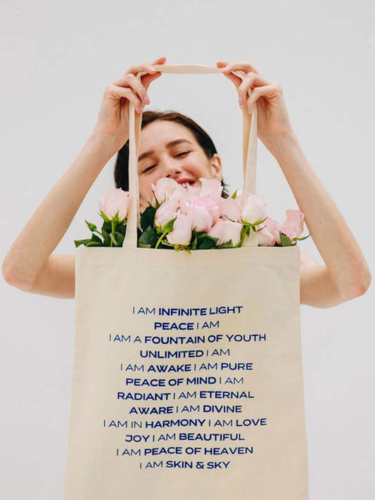 Skin & Sky Tote, designed with affirmations: I AM INFINITE LIGHT, PEACE I AM, I AM A FOUNTAIN OF YOUTH, UNLIMITED I AM, I AM AWAKE I AM PURE, PEACE OF MIND I AM, RADIANT I AM ETERNAL, AWARE I AM DIVINE, I AM IN HARMONY I AM LOVE, JOY I AM BEAUTIFUL, I AM PEACE OF HEAVEN, I AM SKIN & SKY
